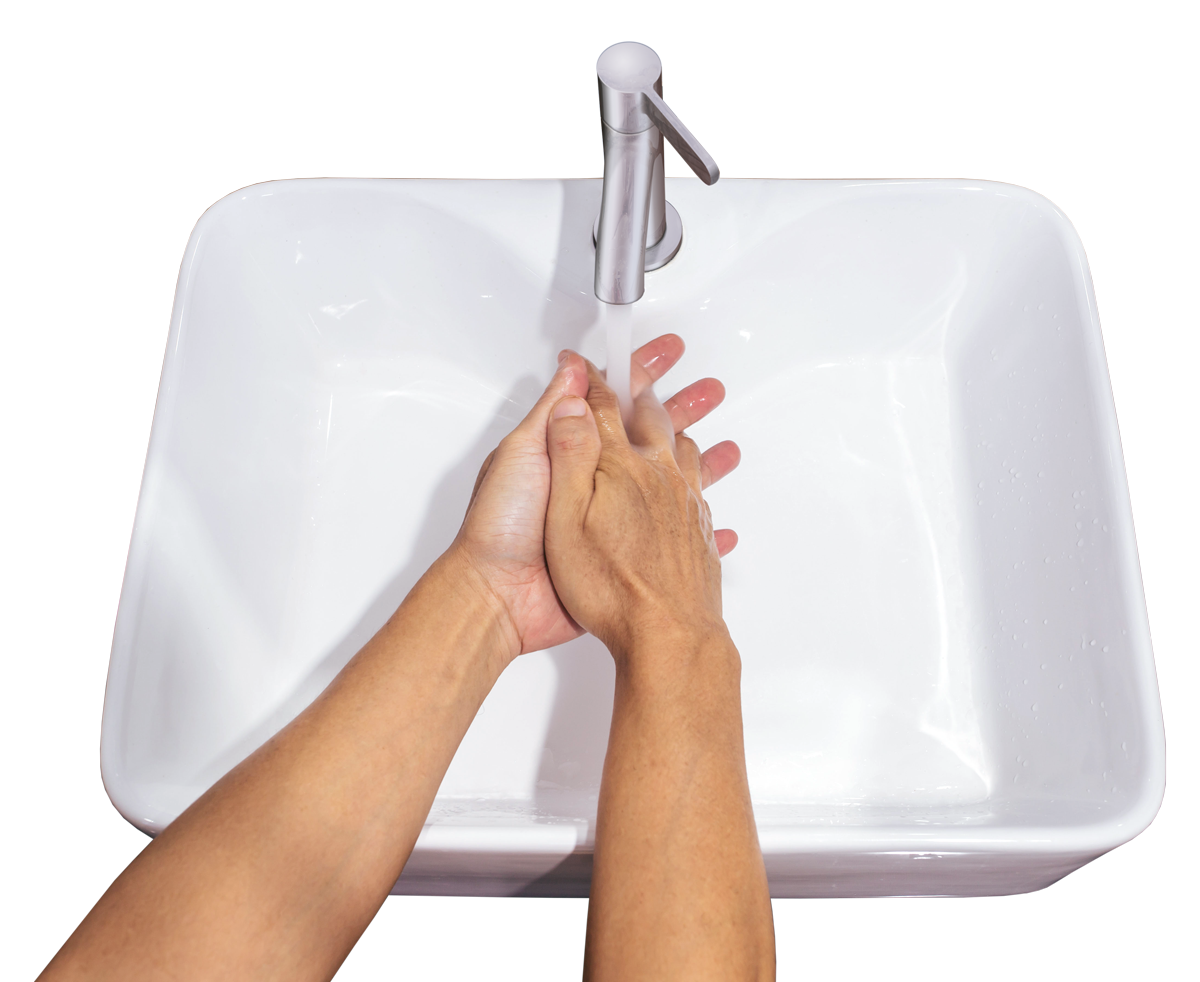 Hands rinsing in sink