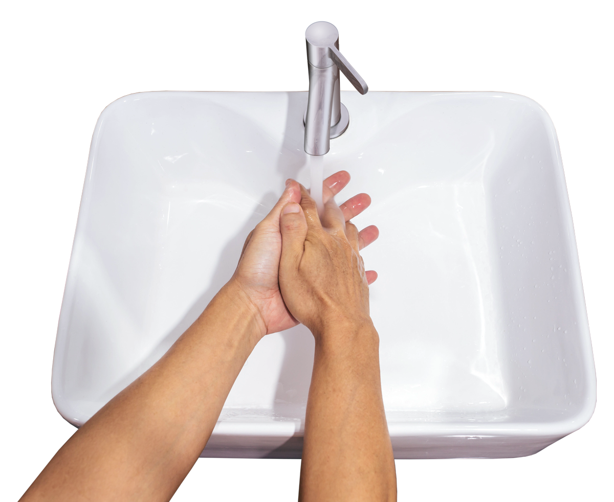 Hands rinsing in sink